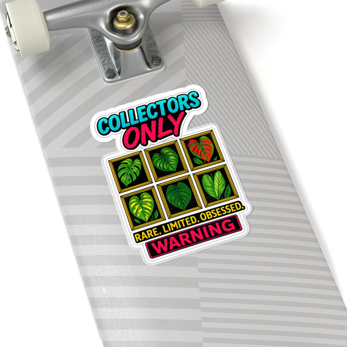 Sticker on a skateboard deck with text and leaf graphics