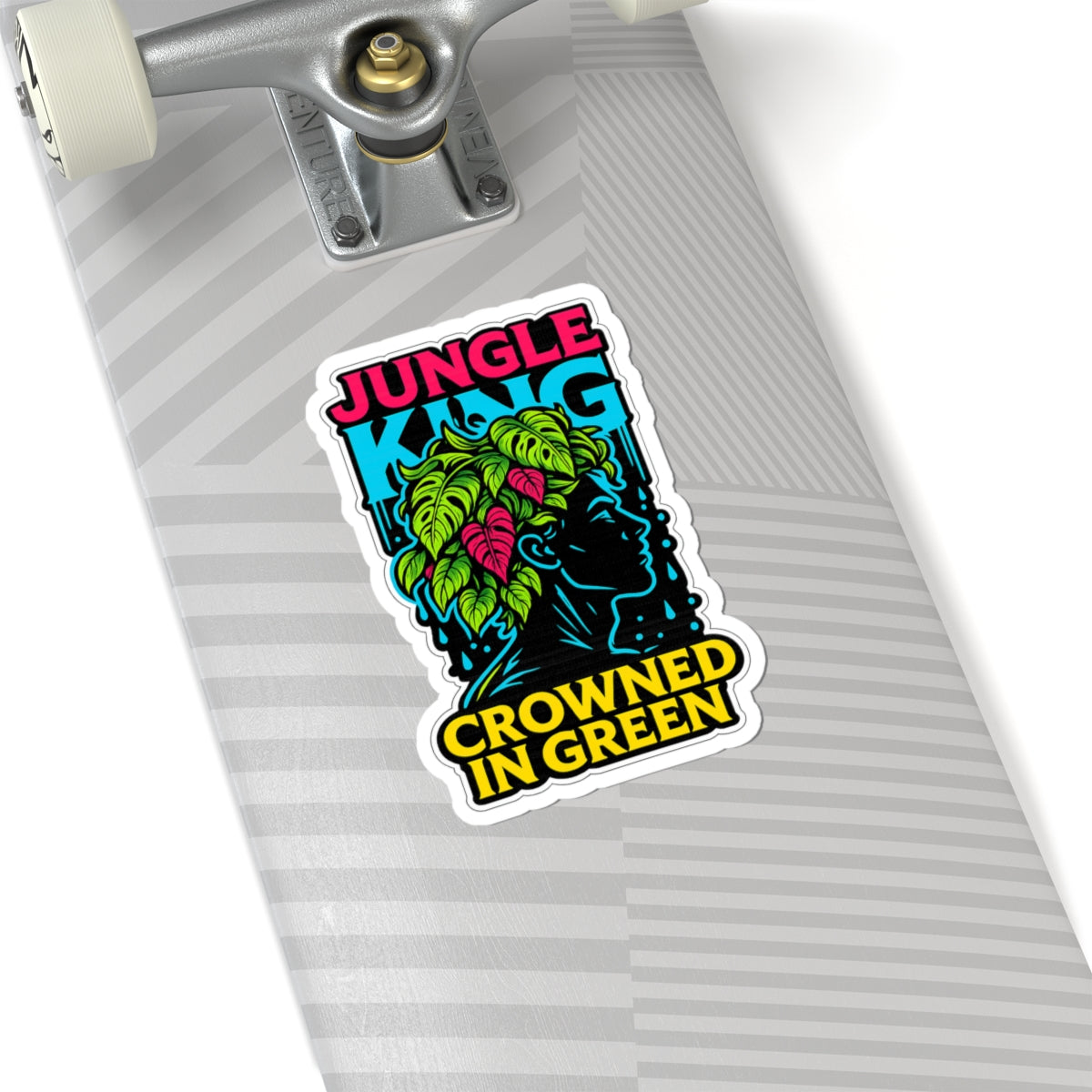 Sticker with 'Jungle King Crowned in Green' design on a skateboard deck.