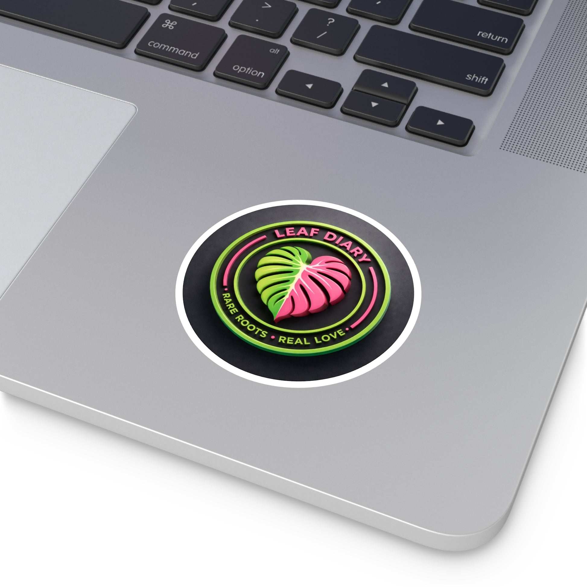 Sticker with a leaf design on a laptop